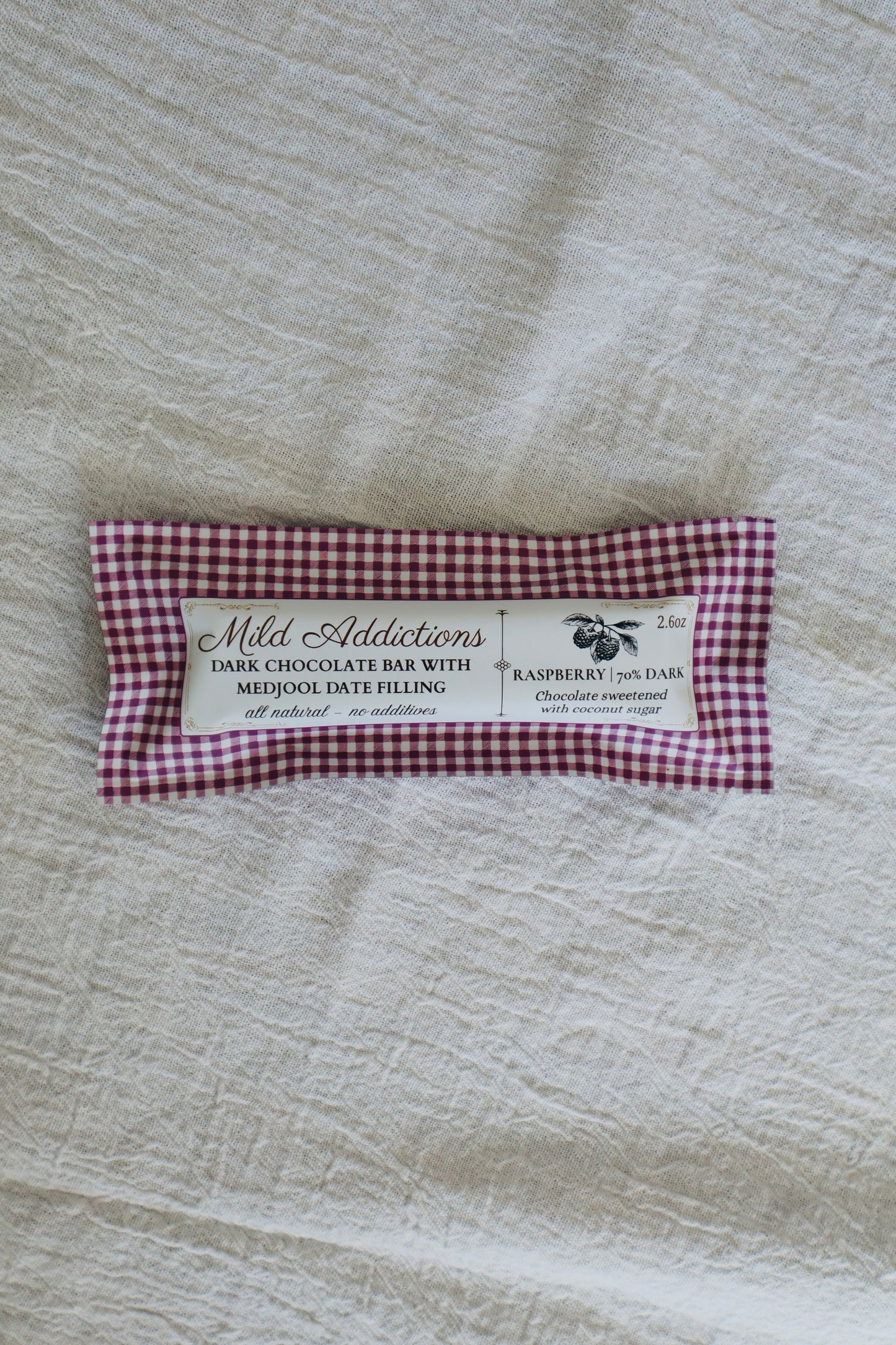 Dark Chocolate Bar with Raspberry & Medjool Date Center— 2.6 oz