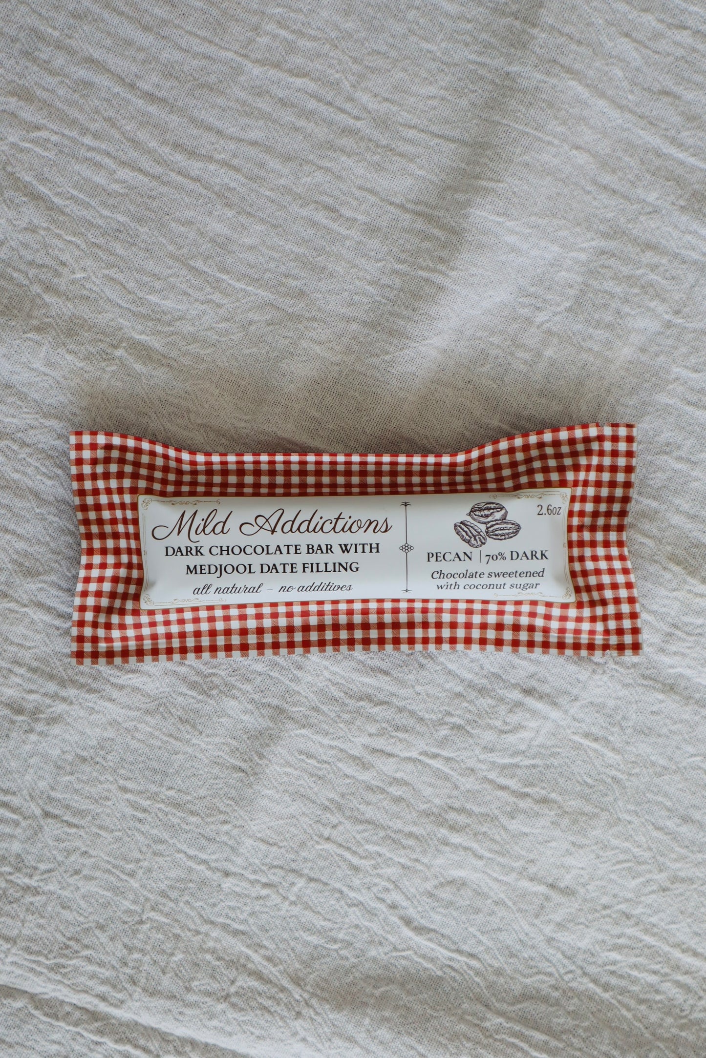 Dark Chocolate Bar with Pecan & Medjool Date Center— 2.6 oz