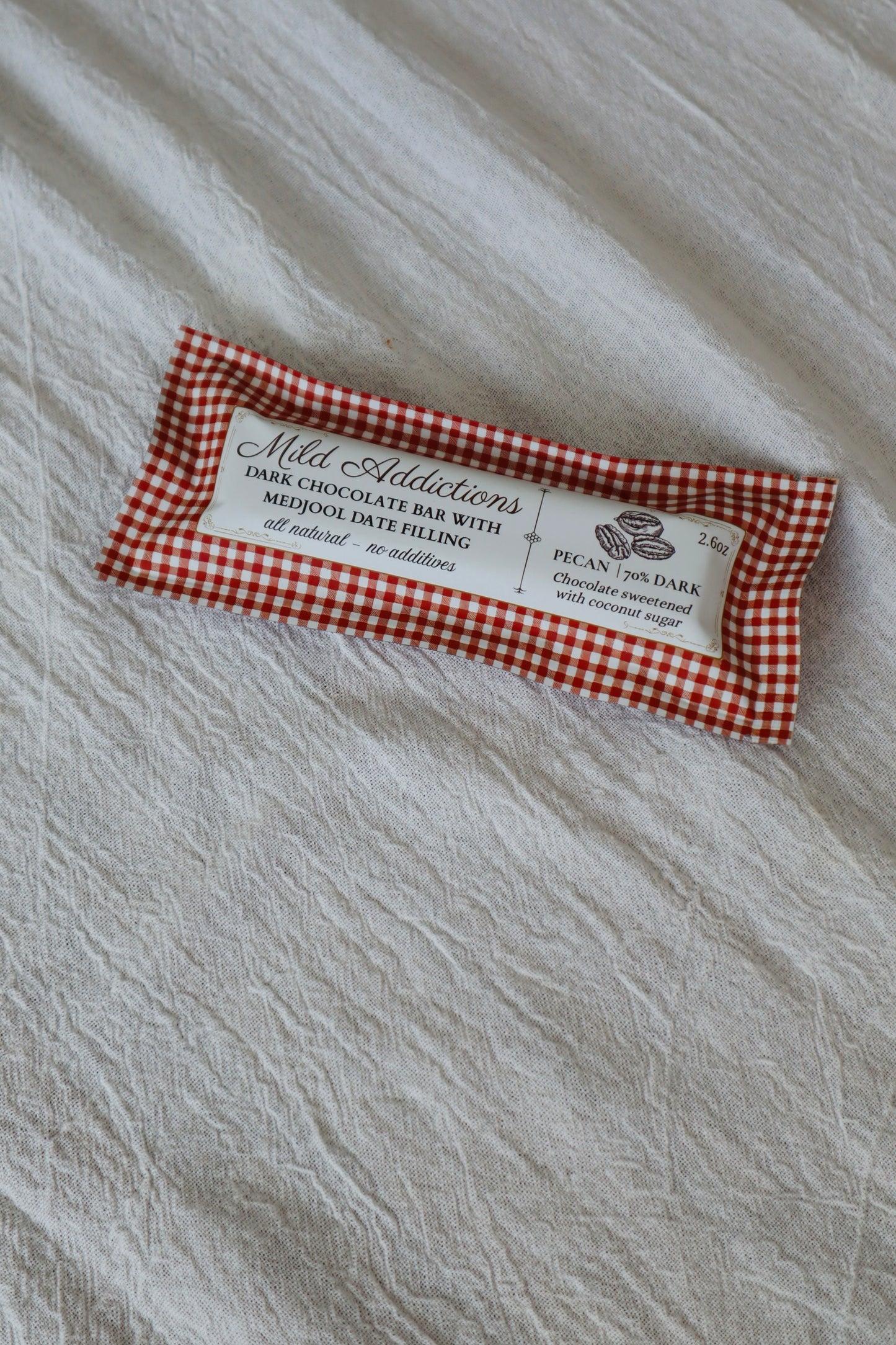 Dark Chocolate Bar with Pecan & Medjool Date Center— 2.6 oz